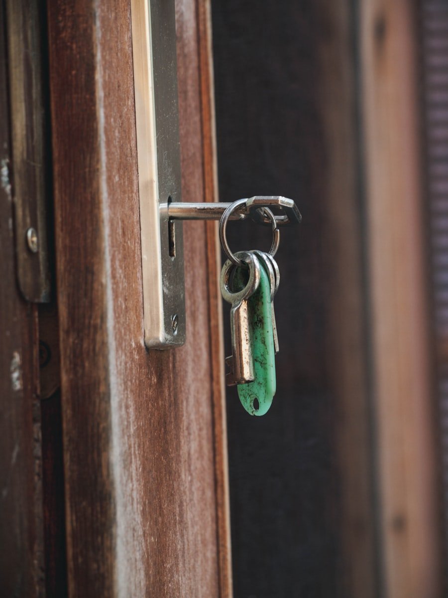 Keys in a wooden door lock — lock change and upgrade